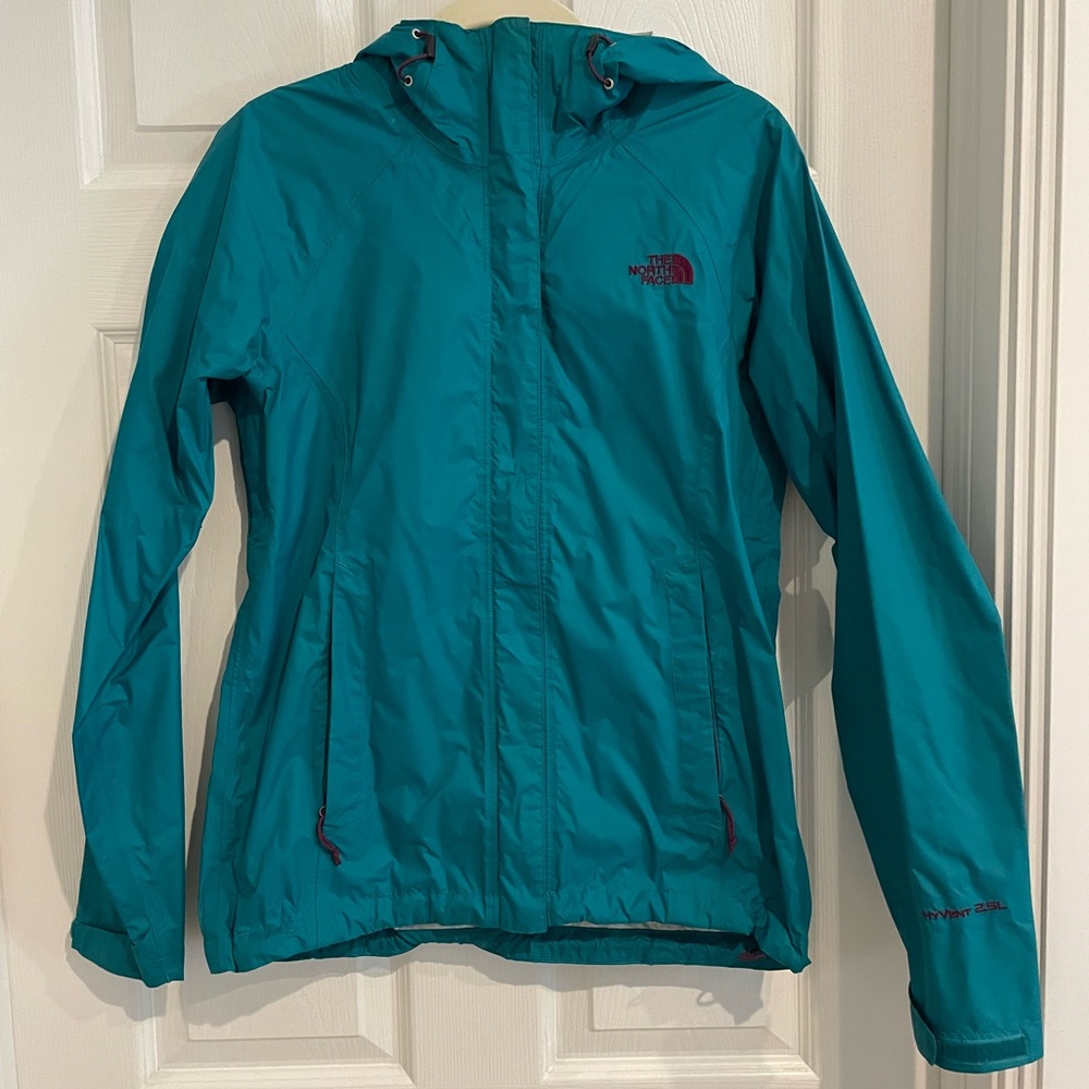 The North Face rain jacket in teal with HyVent armpit vents